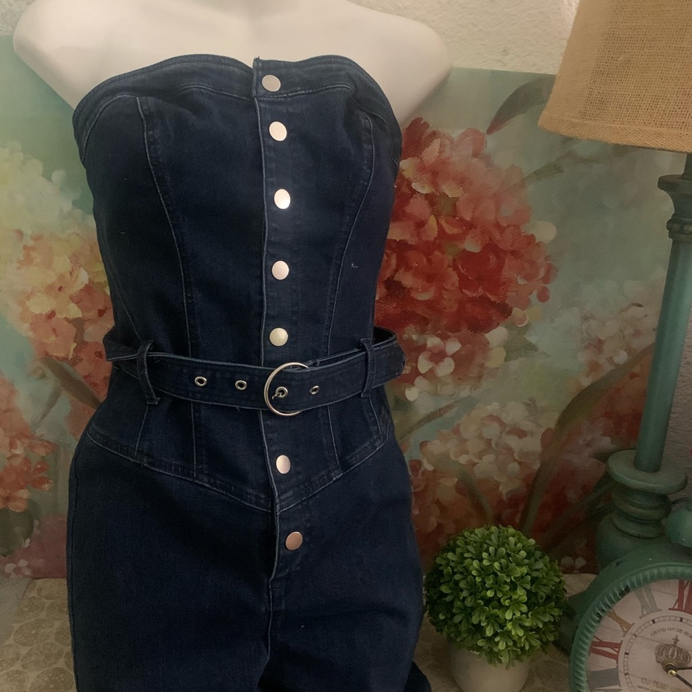 This is a blue Jean jumpsuit made by Guess. The size is small. - Picture 1 of 1